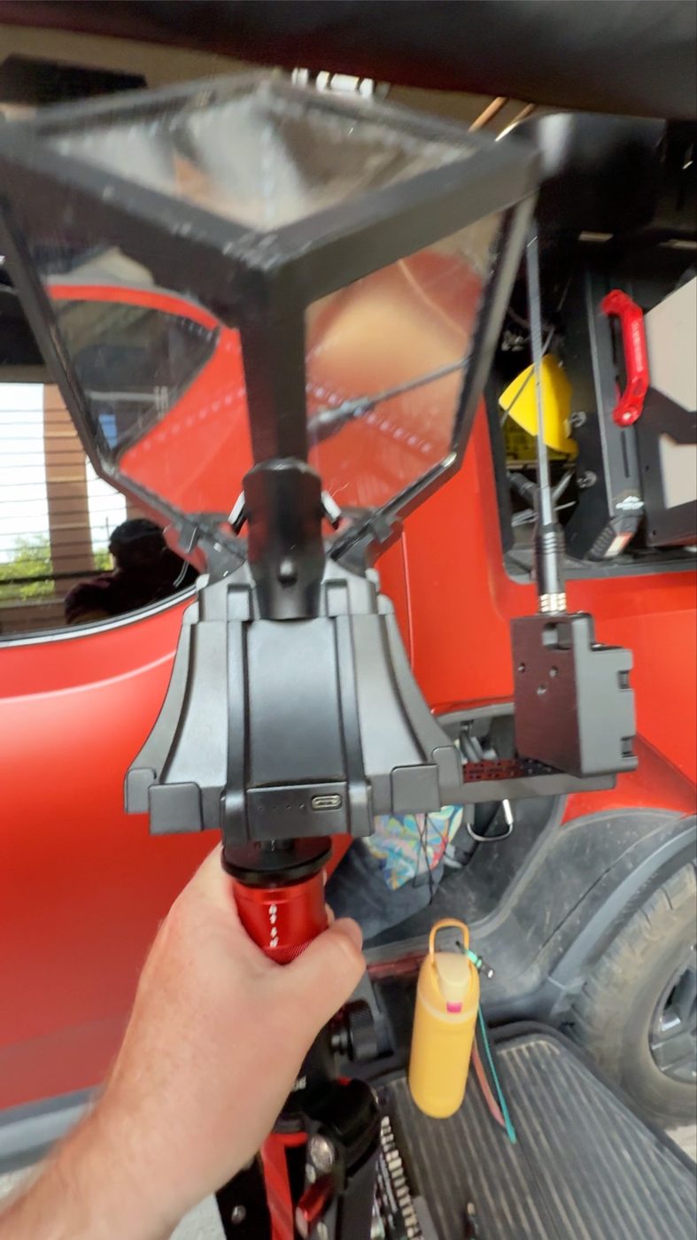 Underside view of a Hyper Cube totem with a T-Echo mounted on a 3D-printed bracket and tripod adapter, antenna pointing up