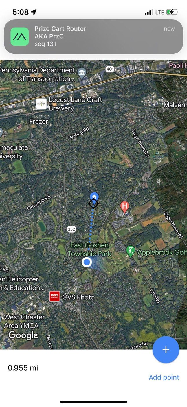 Screenshot of the Meshtastic app showing a portable node mapped 0.955 miles away from base — clean signal through suburban terrain